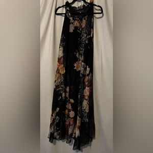 Vintage Bohemian sleeveless dress with ruffles around the neckline & bottom